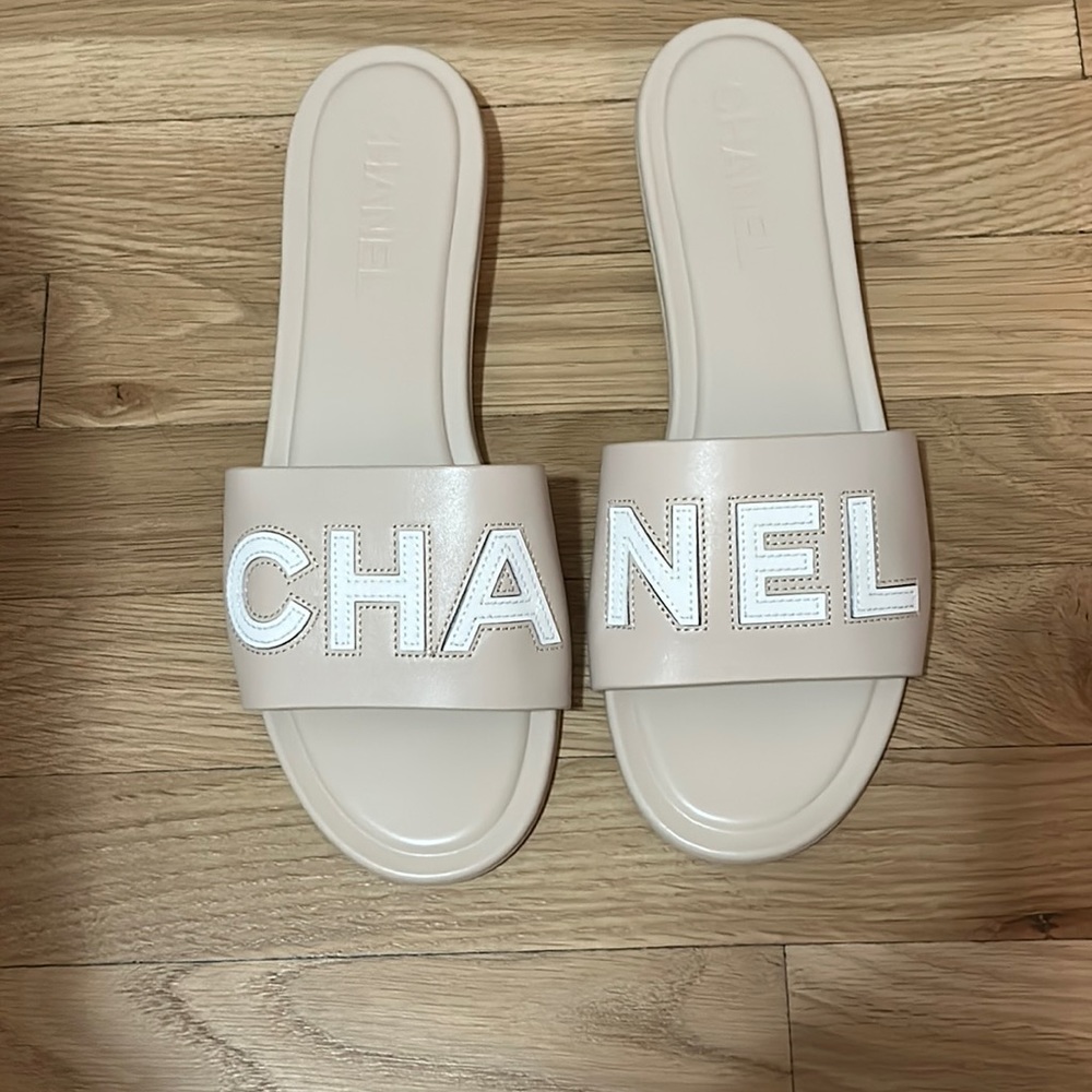 Tan CHANEL logo slides 42